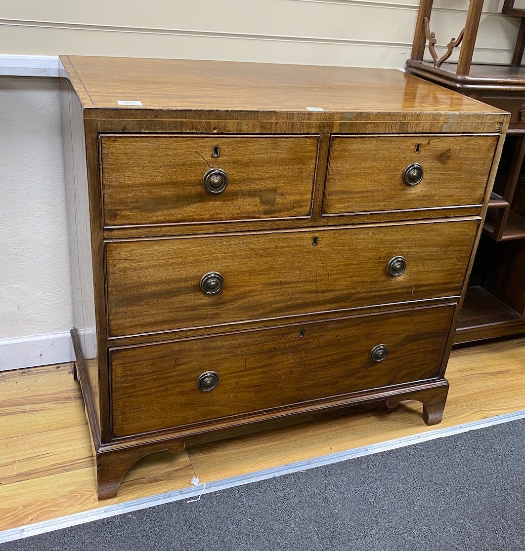 A small George IV mahogany chest of two short and two long drawers, width 90cm, depth 50cm, height 88cm